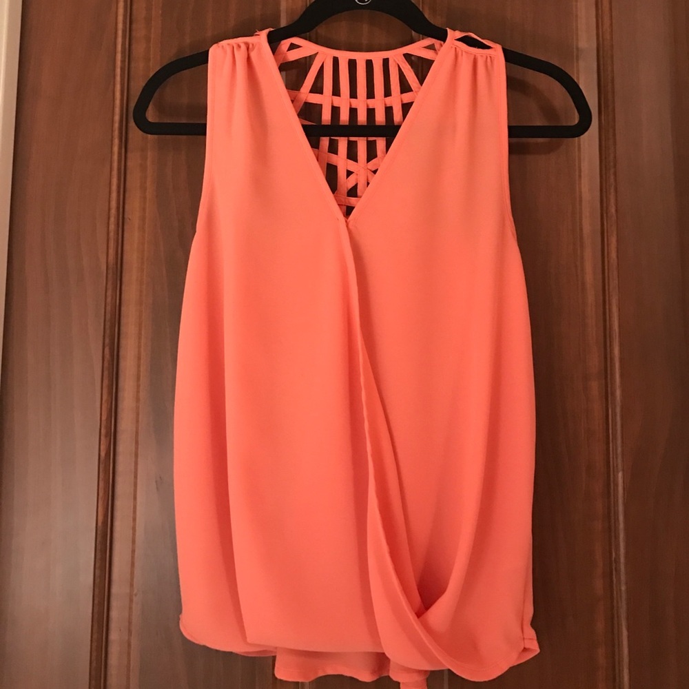 Orange sleeveless shirt with detail back