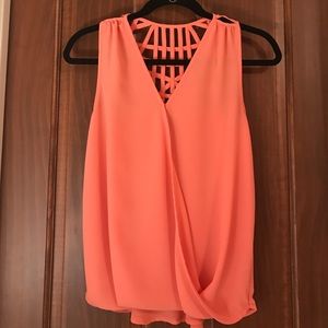 Orange sleeveless shirt with detail back