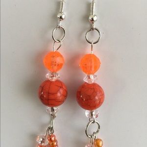 Orange bead dangle earrings