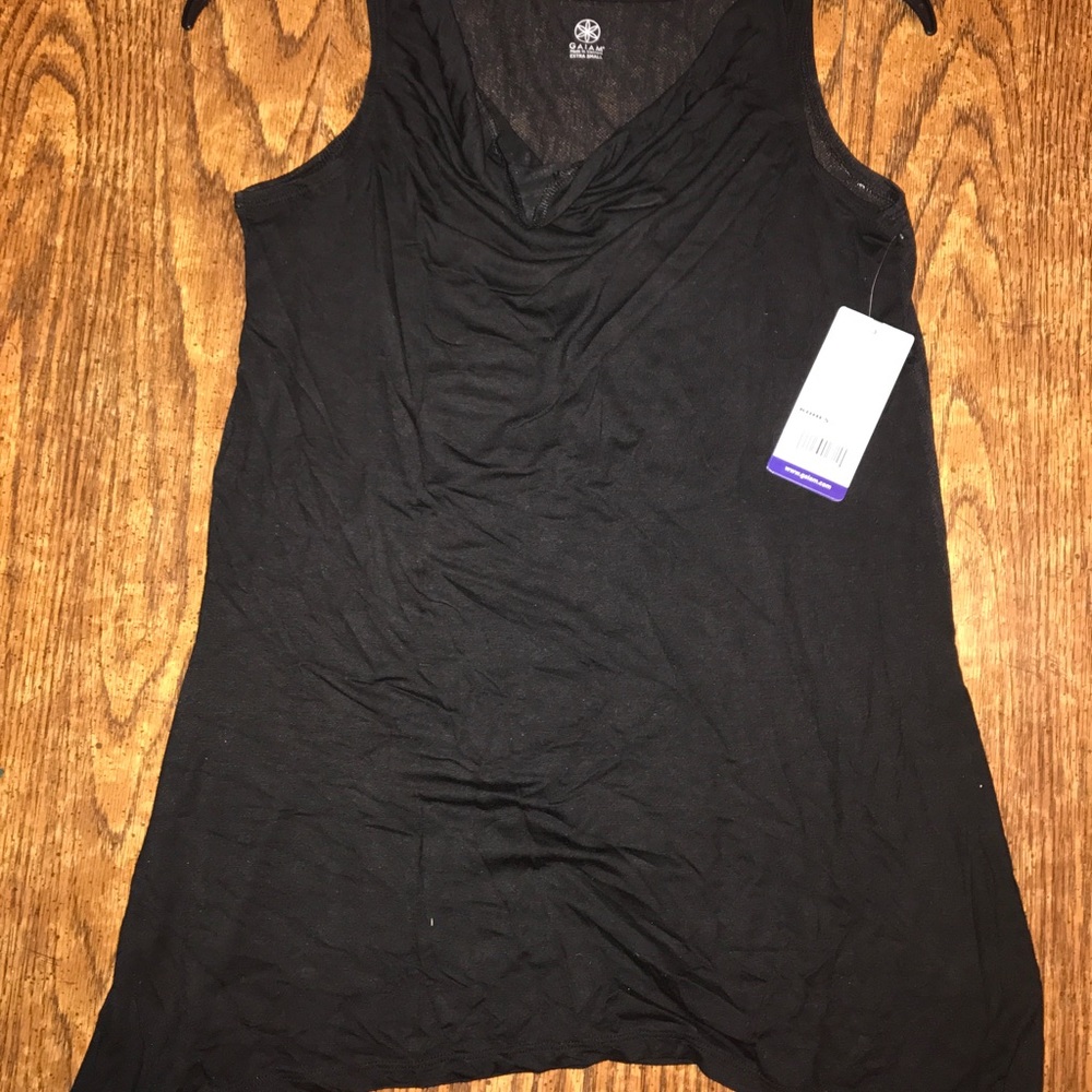 Black casual tank size XS runs larger