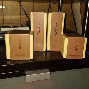 Assortment of Adore skin care products