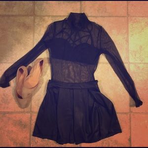 Sheer black turtle neck, size small