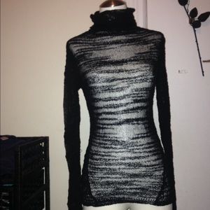 Sheer black turtleneck sweater