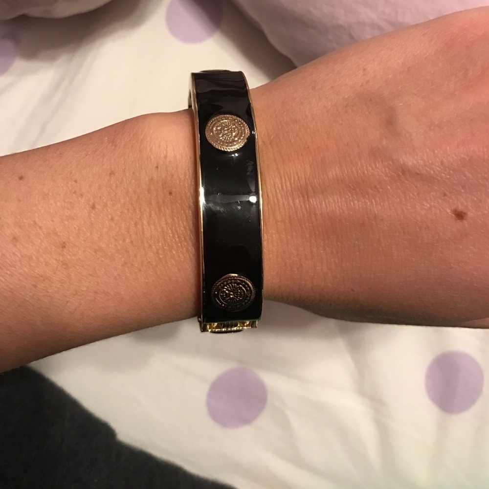 Never worn out. Black and gold bangle