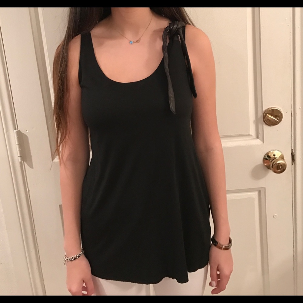 A tank with leather strap