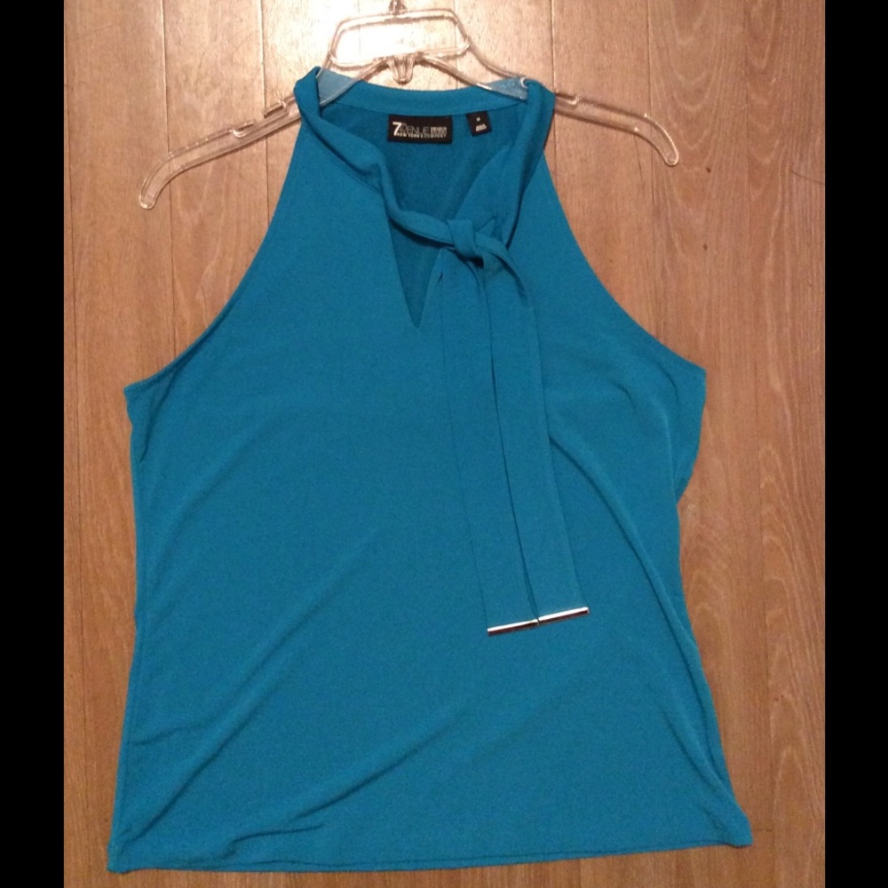 Sleeveless blue blouse