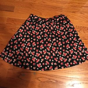 Black skirt with red roses
