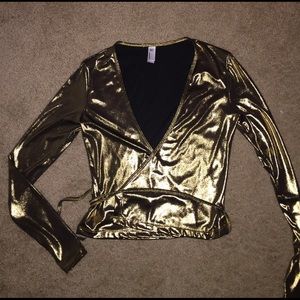 Long sleeve metallic gold crop top.