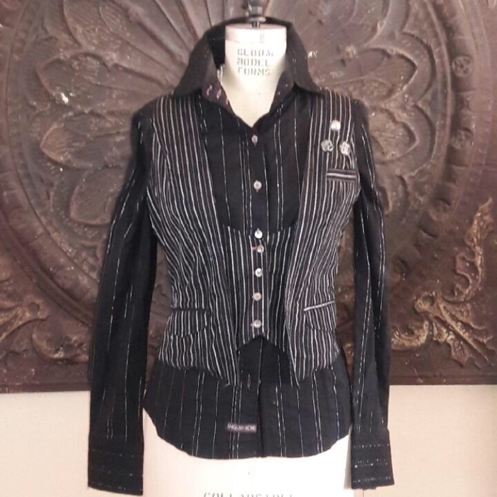 Black, pinstriped blouse with cool pinstriped vest