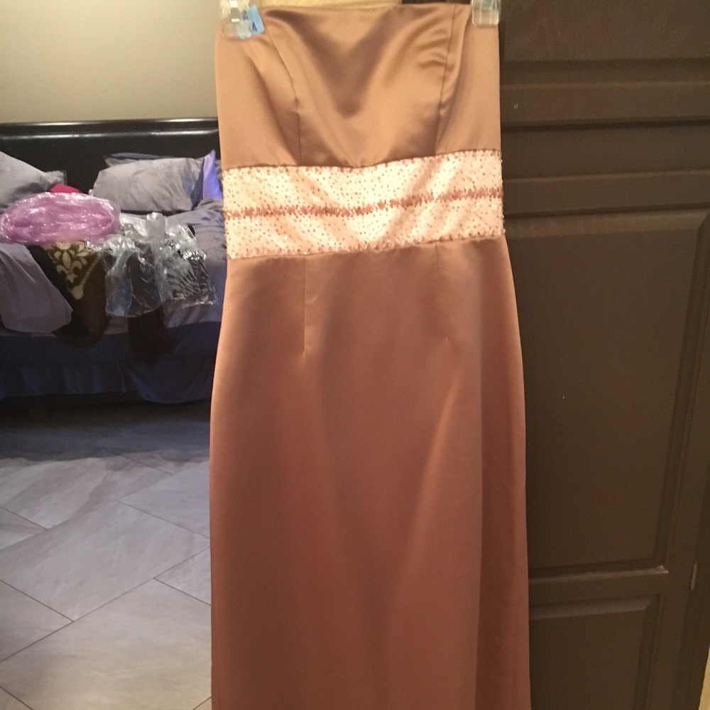 Full length satin strapless gown