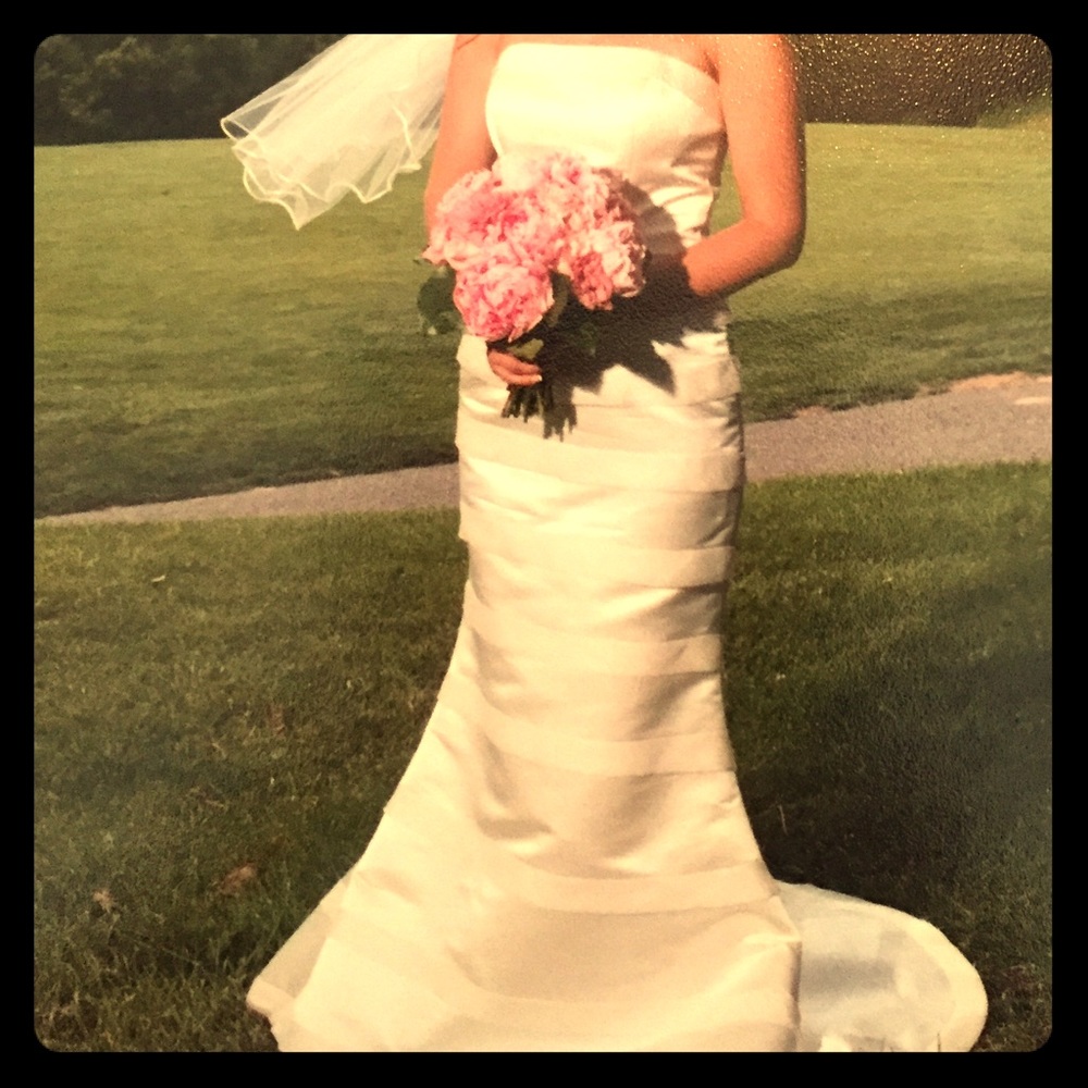 Silk off-white strapless wedding gown
