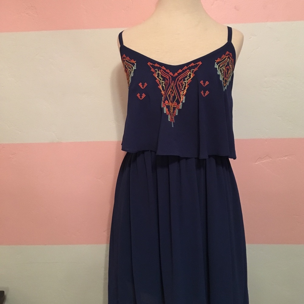 Navy blue dress with print in the top
