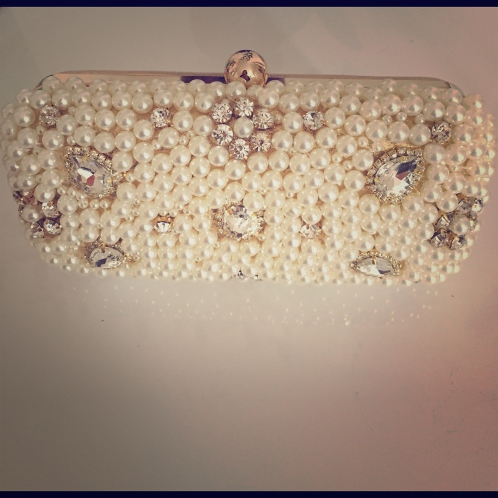 Bebe metallic katara pearl clutch