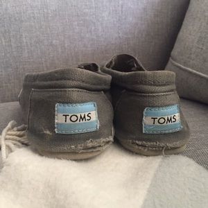 Gray TOMS slip ons