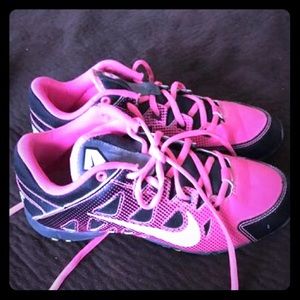 Girls Nike softball cleats.