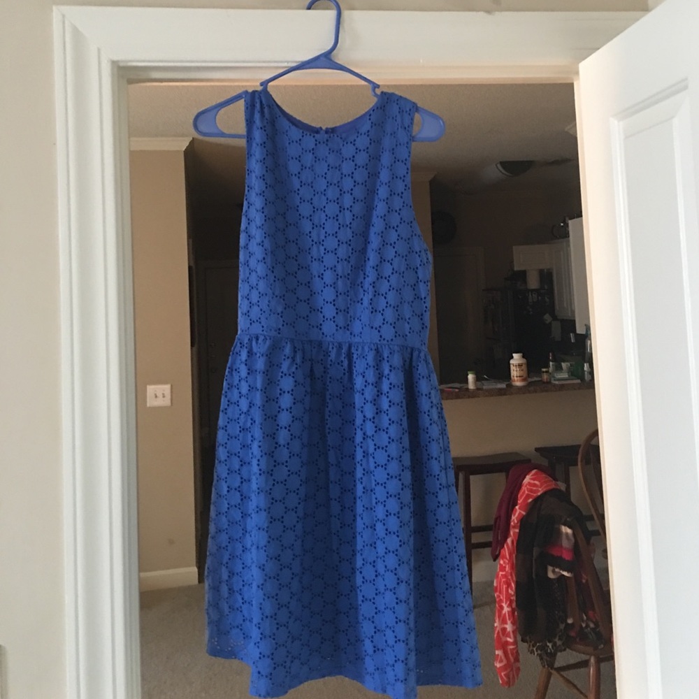 Light blue eyelet sleeveless dress.
