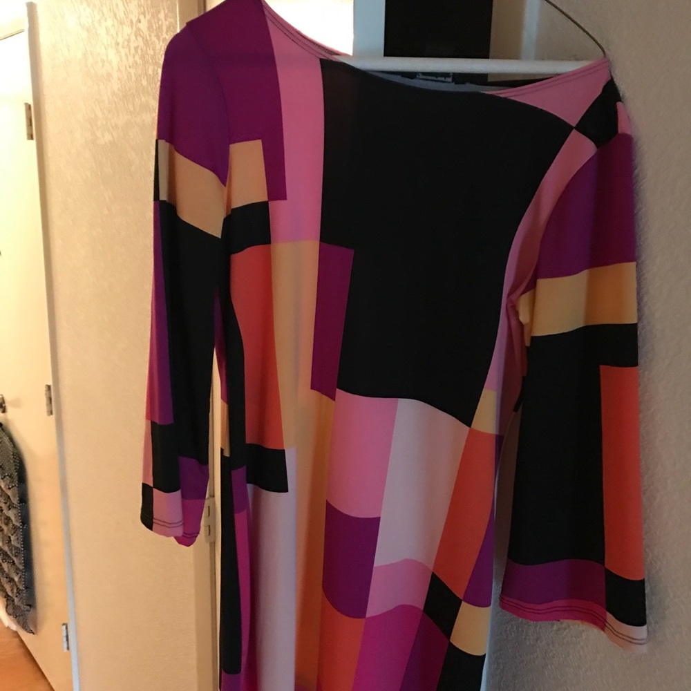 Multi color tunic, very pretty! New without tags.