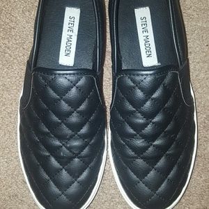 Steve Madden slip on's.