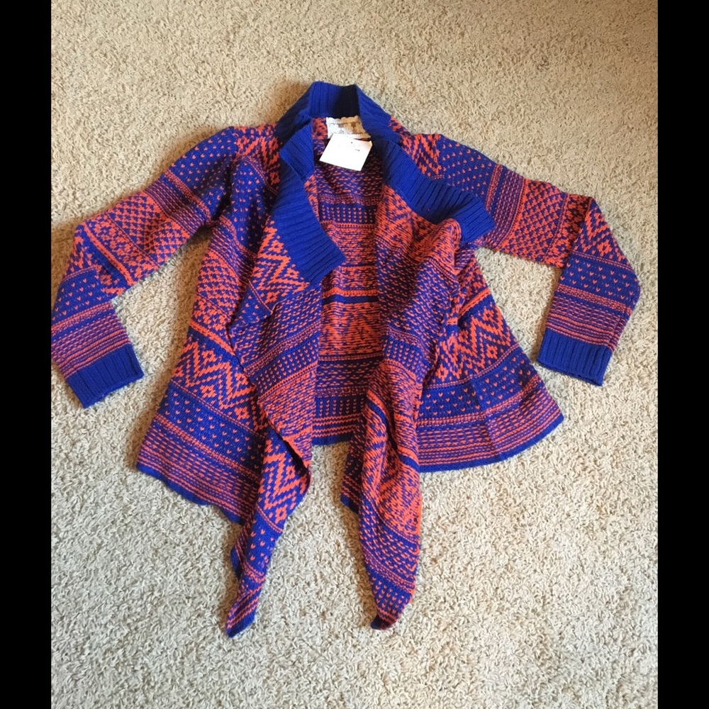 Never worn Spool72 blue and rust colored sweater!