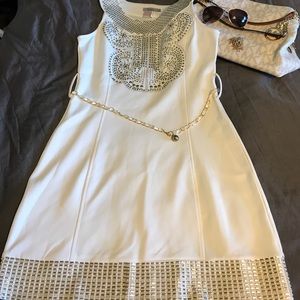 Gorgeous NWT boutique dress with gold beading .