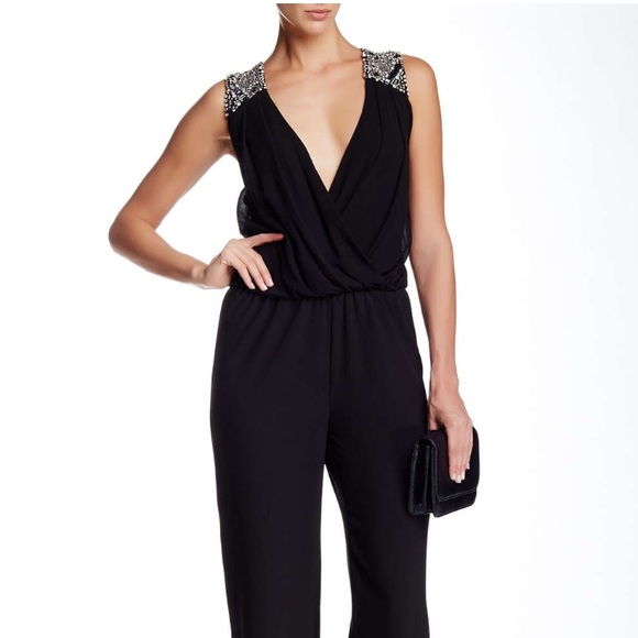City Triangles Pants - 1 hour price drop. New, black beaded jumpsuit.