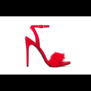 Red furry heels