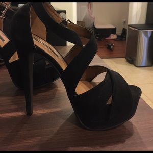 Platform high heel shoes.