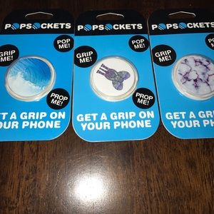 Mobile phone grip/pop socket