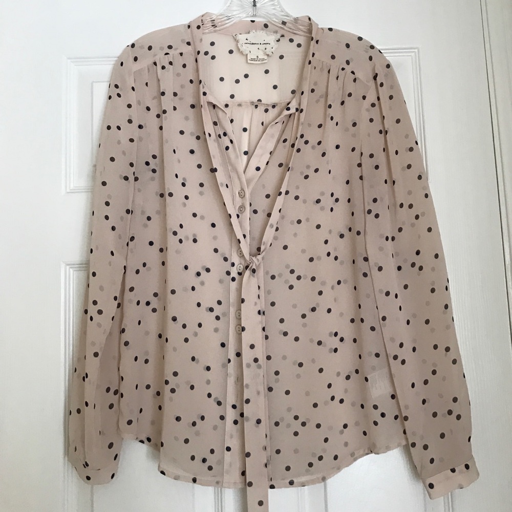 Polk a dot blouse with neck tie