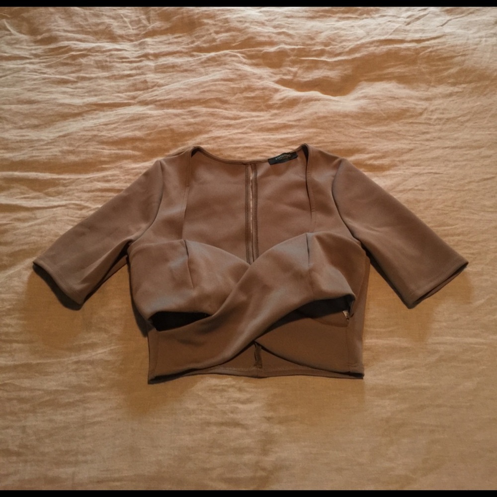 Gray polyester spandex top by Solemio Los Angeles.