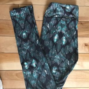 Lularoe charcoal with teal leaves leggings