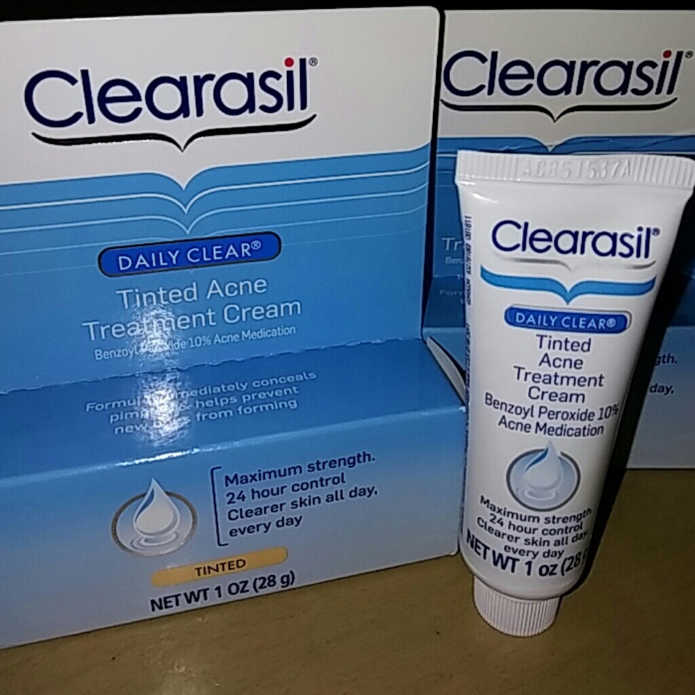 2 bottles of Clearasil tinted acne treatment cream
