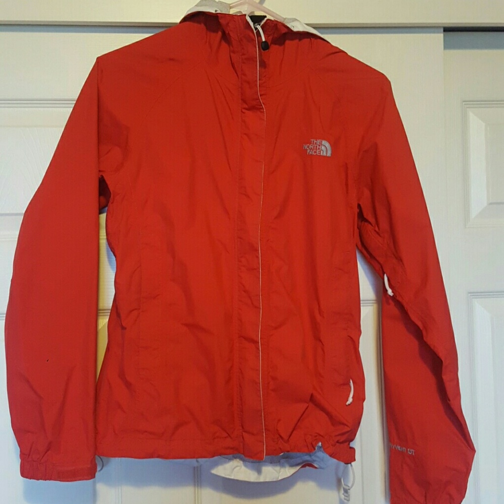 Red North Face jacket.