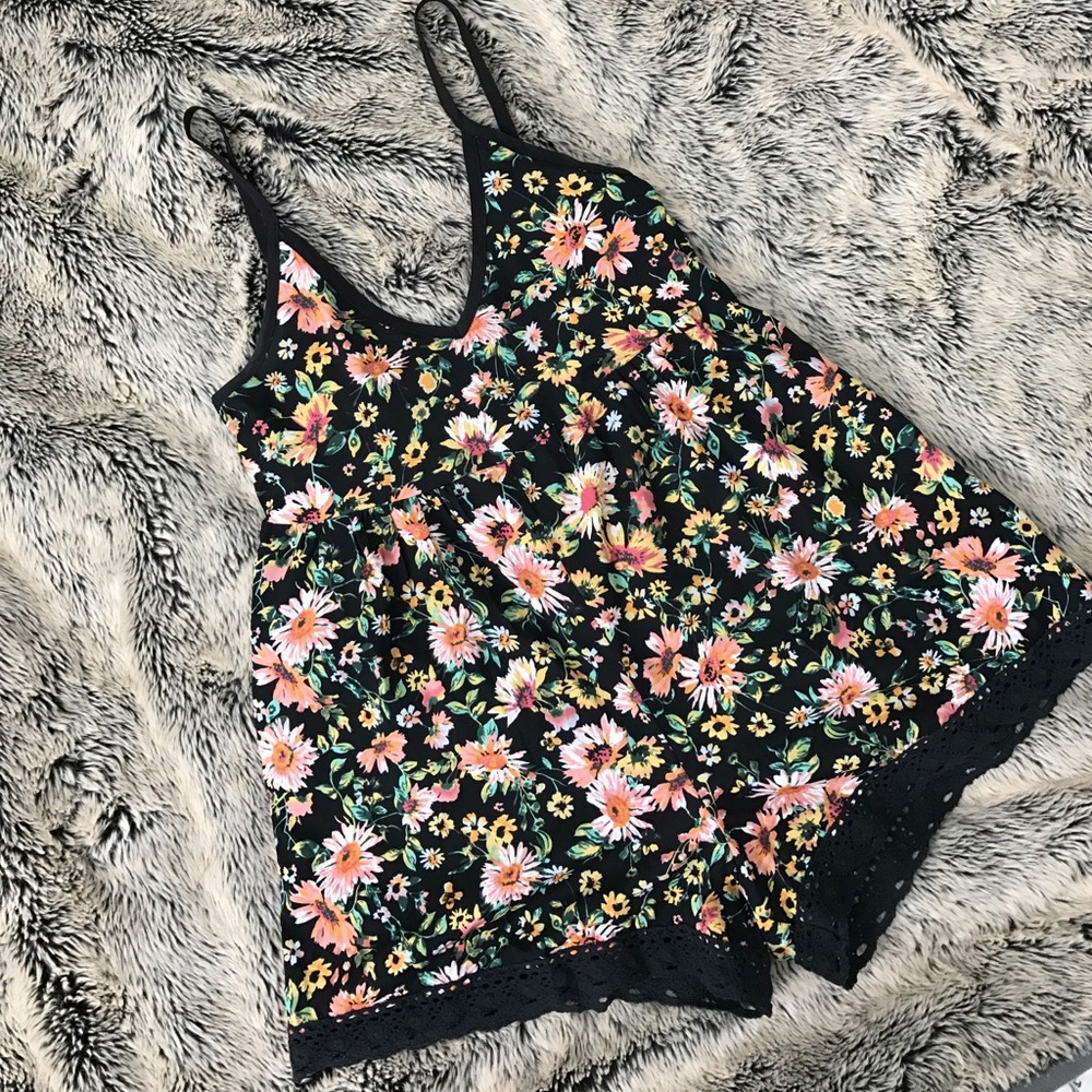 Super cute floral romper.