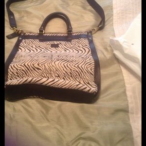 13" Fossil purse, used once, excellent condition.
