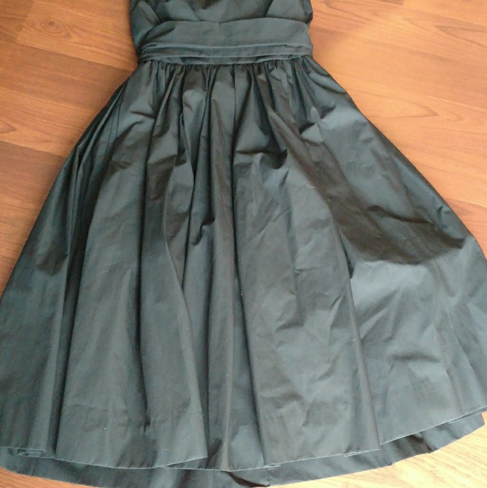 Black formal strapless cocktail dress.