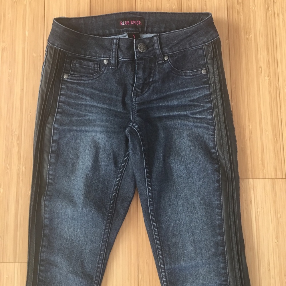 Super stretchy denim with black leather sides.