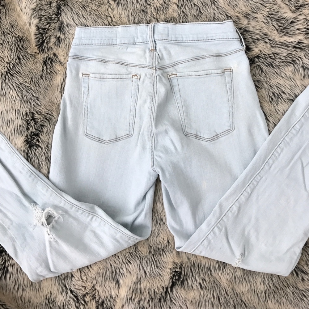 Light blue Pacsun ripped jeans.