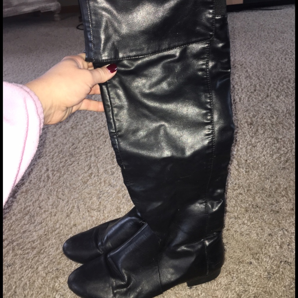 Tall black boots