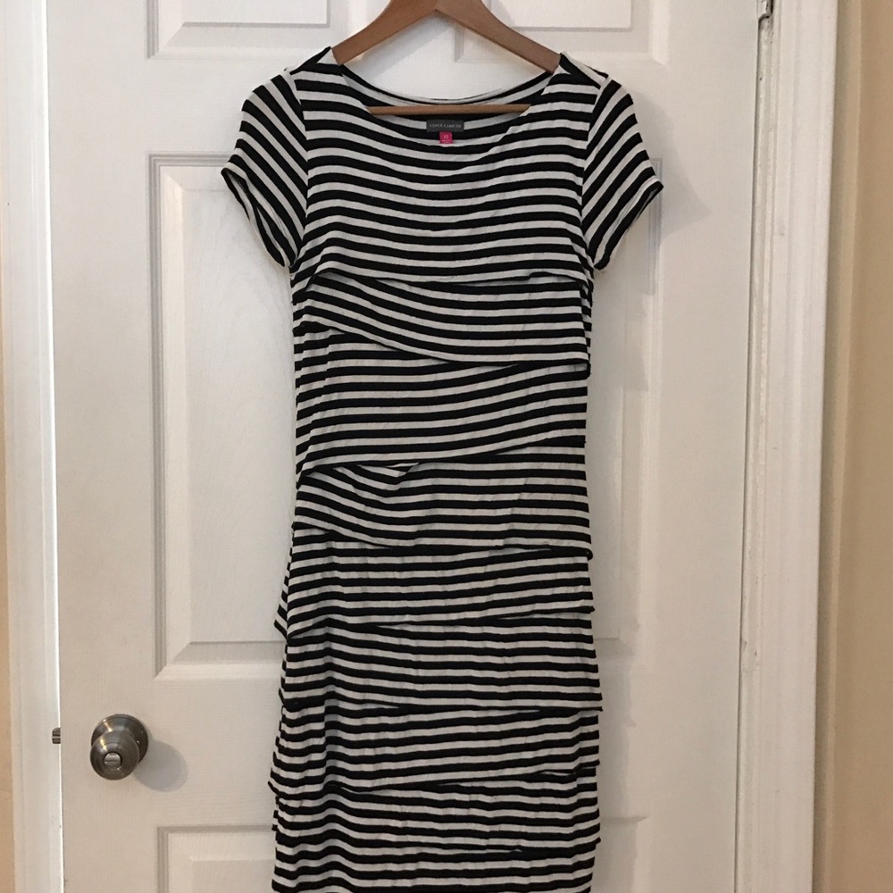 Curve hugging, classy, and elegantly worn dress