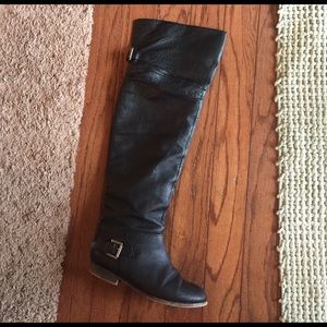 P-lazzo over the knee black leather boots.