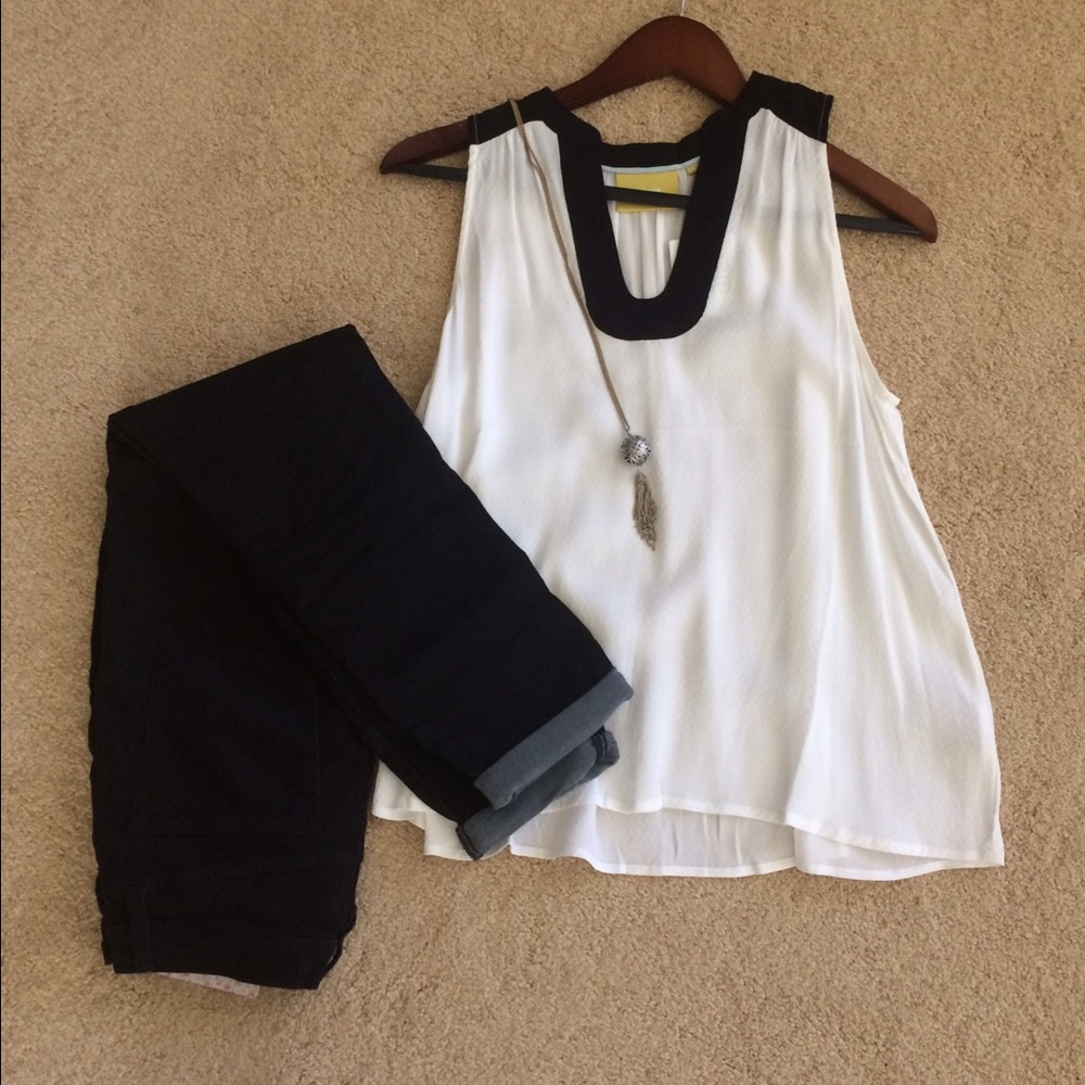 White blouse with black trim