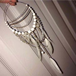 Bebe feather earring