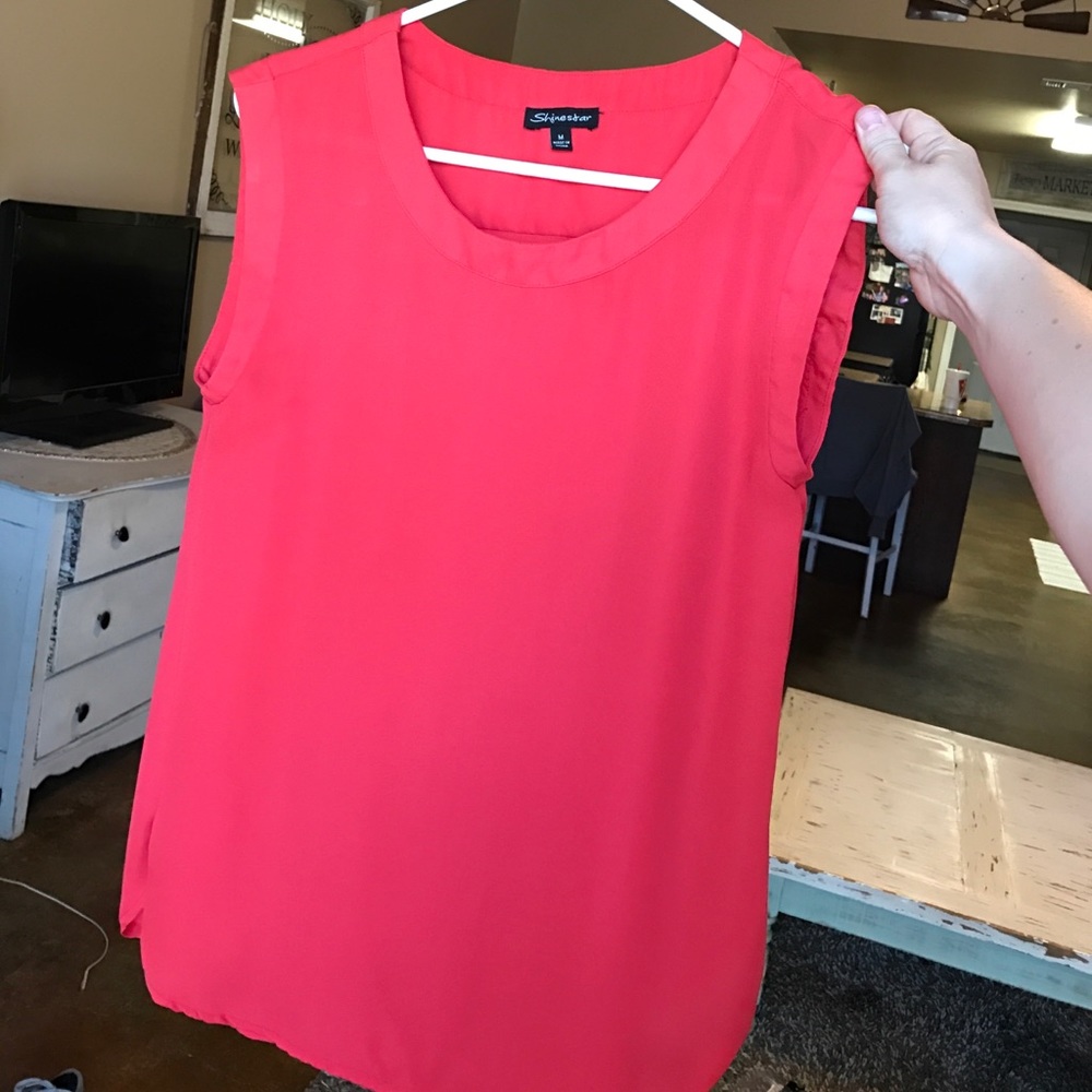 Coral sleeveless blouse