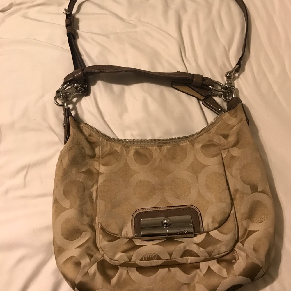 Gold coach purse