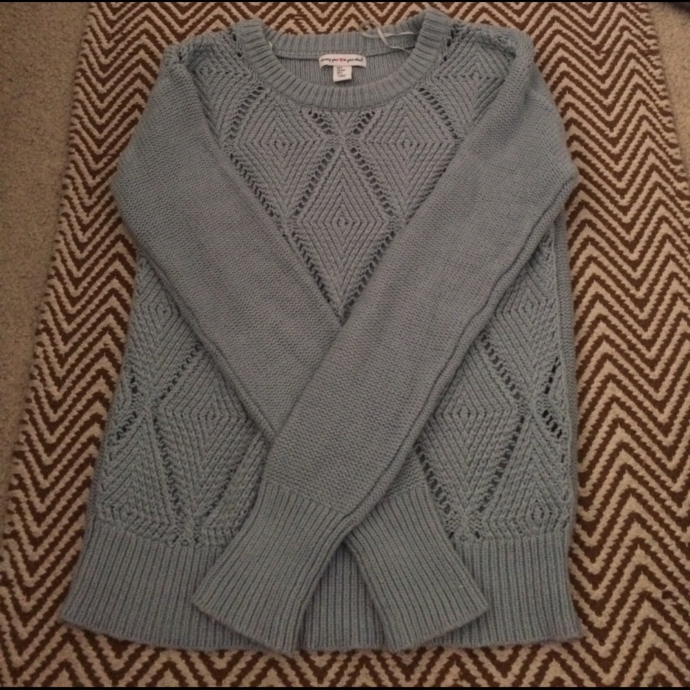 Wearing your heart on your sleeve sweater