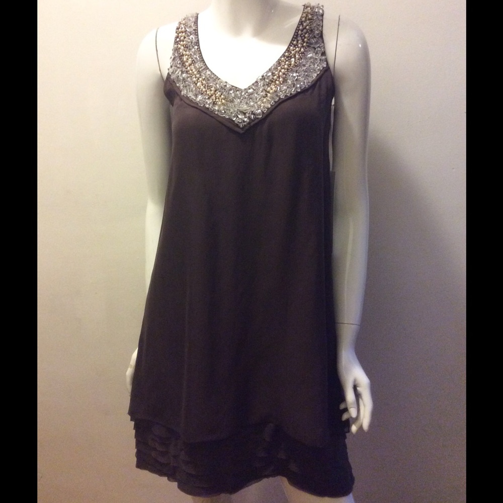 Sleeveless silk dress with beaded neckline