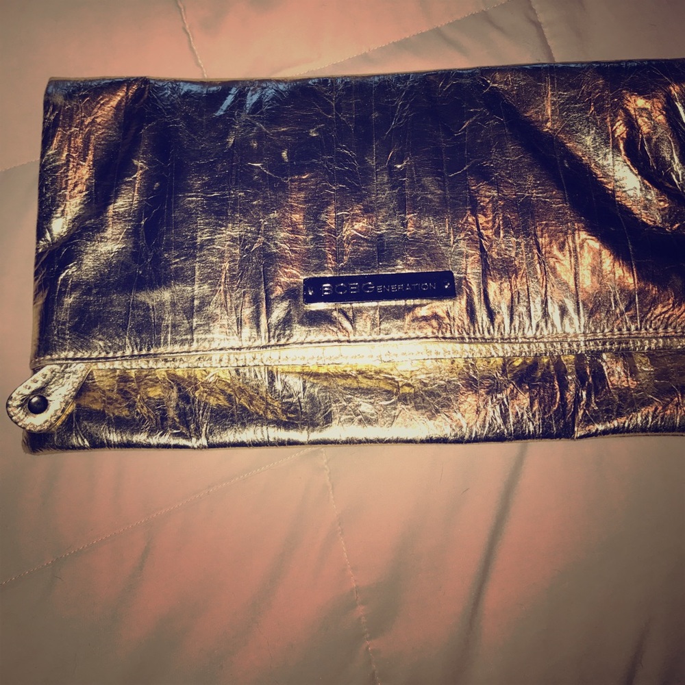 BCBG gold clutch!