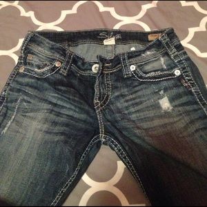 Silver distressed jeans