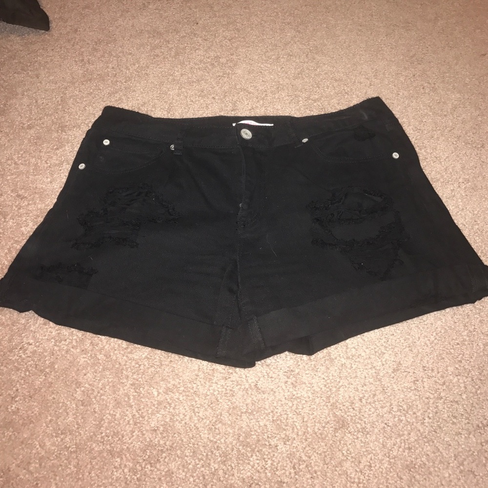 Black distressed shorts